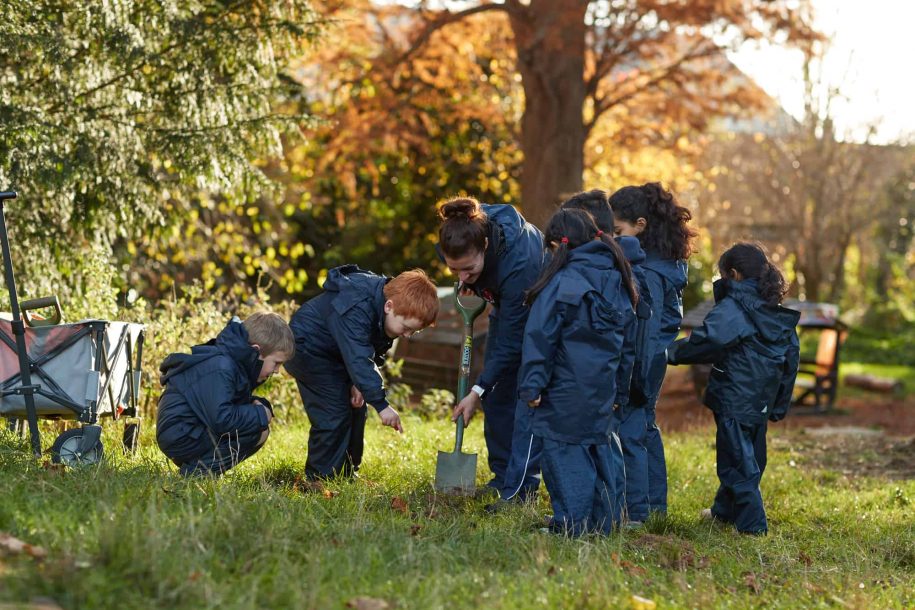 Fairfield children digging in Forest School