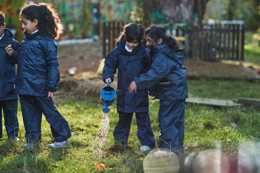 Fairfield children watering the fields over at Forest School