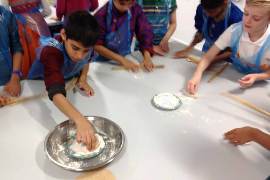Fairfield children making dough in the cookery room