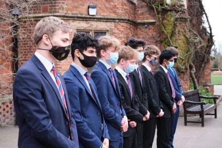 Grammar School students observe minute silence to mark a year since Covid lockdown featured image